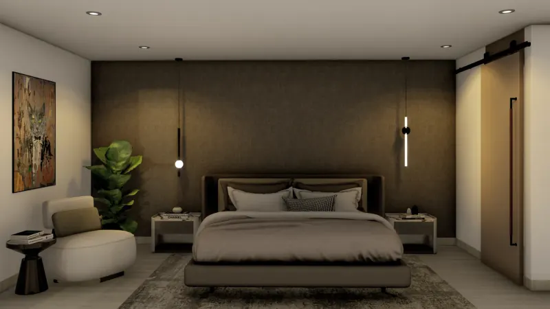 Recámara con muro de cabecera oscuro, dos lámparas colgantes, sillón crema y puerta corrediza con riel negro