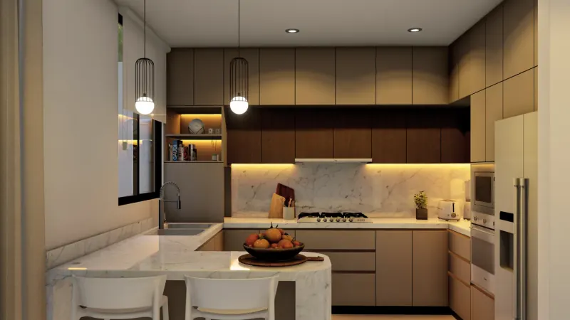 Cocina de Casa Cañadas en otro ángulo: gabinetes lisos en tonos café, revestimiento veteado, estufa y refrigerador